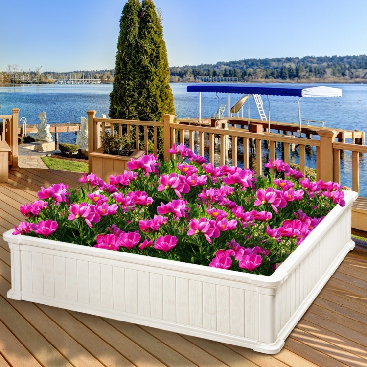 48-inch white raised garden bed planter filled with vibrant pink flowers, perfect for enhancing any patio or garden.