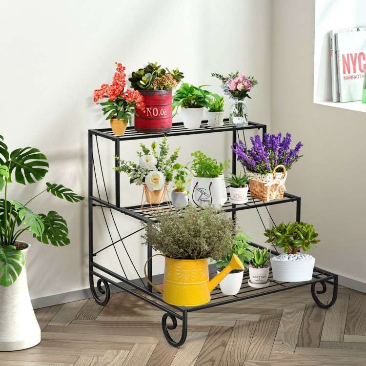 Three-tier outdoor metal garden planter holder shelf in black, showcasing potted plants for stylish home or patio decor.