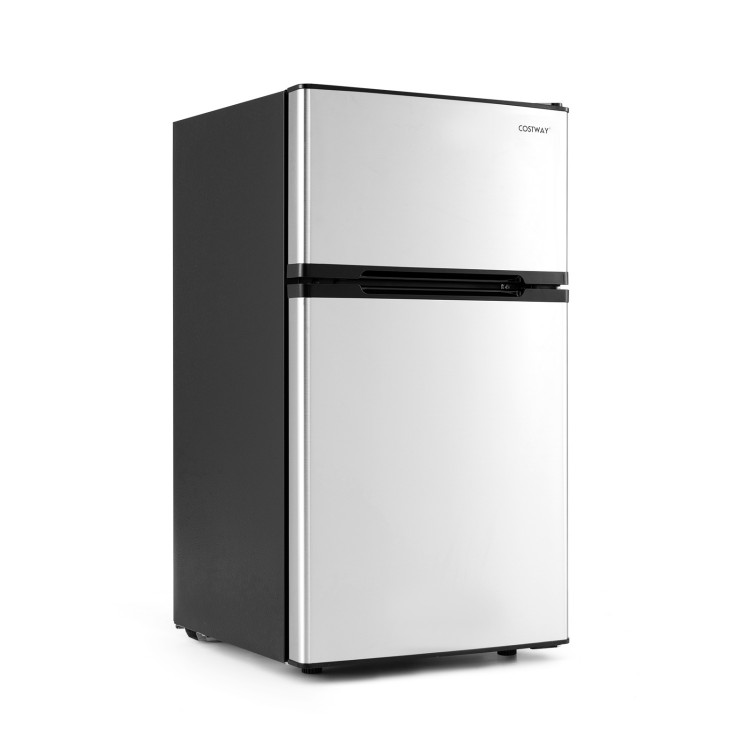 Compact 3.2 cu.ft silver mini fridge with freezer, adjustable thermostat, and removable shelves for small spaces.
