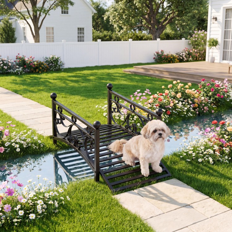 Garden metal bridge with dual patterned side rails, featuring a slatted walkway and arched frame, ideal for landscaping.