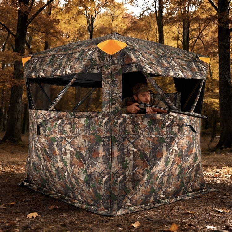3-4 person hunting blind with camouflage pattern and silent-slide windows, designed for stealthy outdoor hunting.