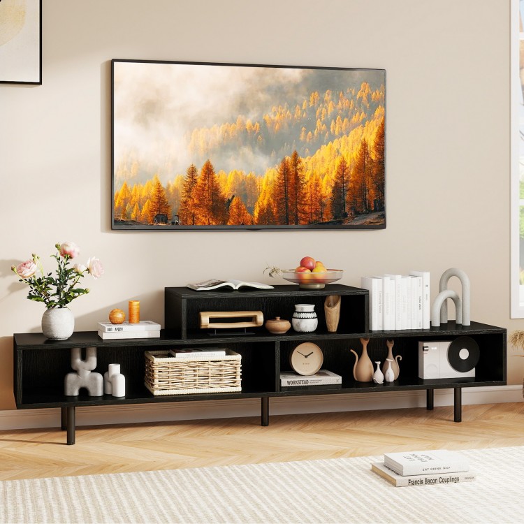 Black 3 cubby TV stand with open storage compartments, suitable for TVs up to 70 inches, perfect for living room.