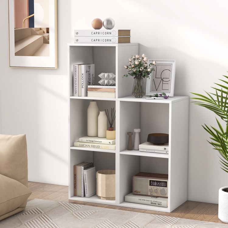 Three-cube bookshelf in white with back guardrail, ideal for organizing books and decor in living room or bedroom.