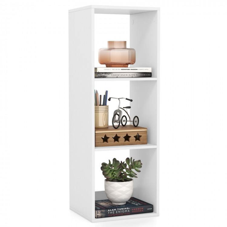 Three-cube bookshelf in white with back guardrail, featuring books, decor, and a plant for stylish organization.