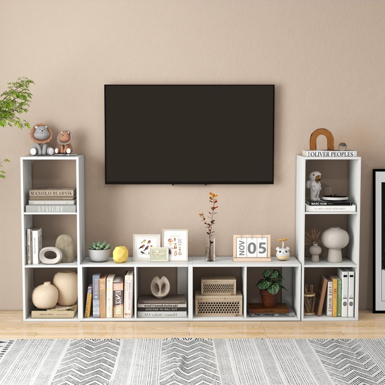 3-cube bookshelf in white with back guardrail, featuring ample storage for books and decorative items in a living room.