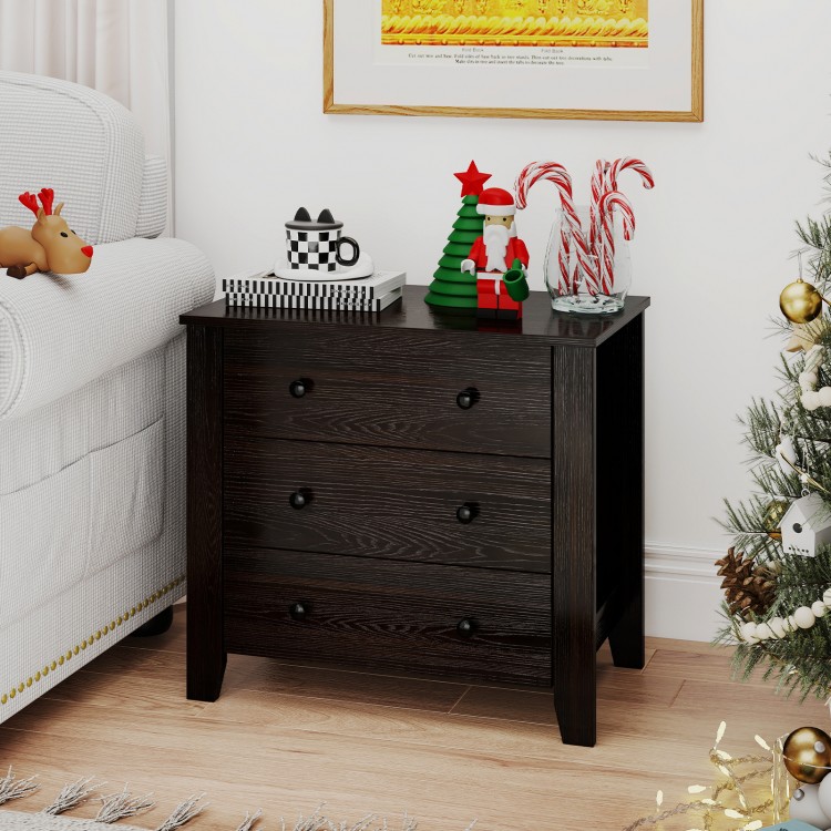 Dark brown 3-drawer dresser nightstand with ample storage, placed beside a cozy sofa and decorated for the holidays.