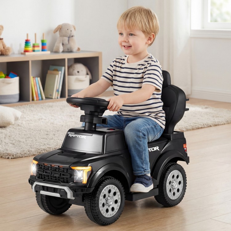 Toddler riding a black 3-in-1 licensed Ford push car with multifunctional steering wheel, ideal for indoor or outdoor.