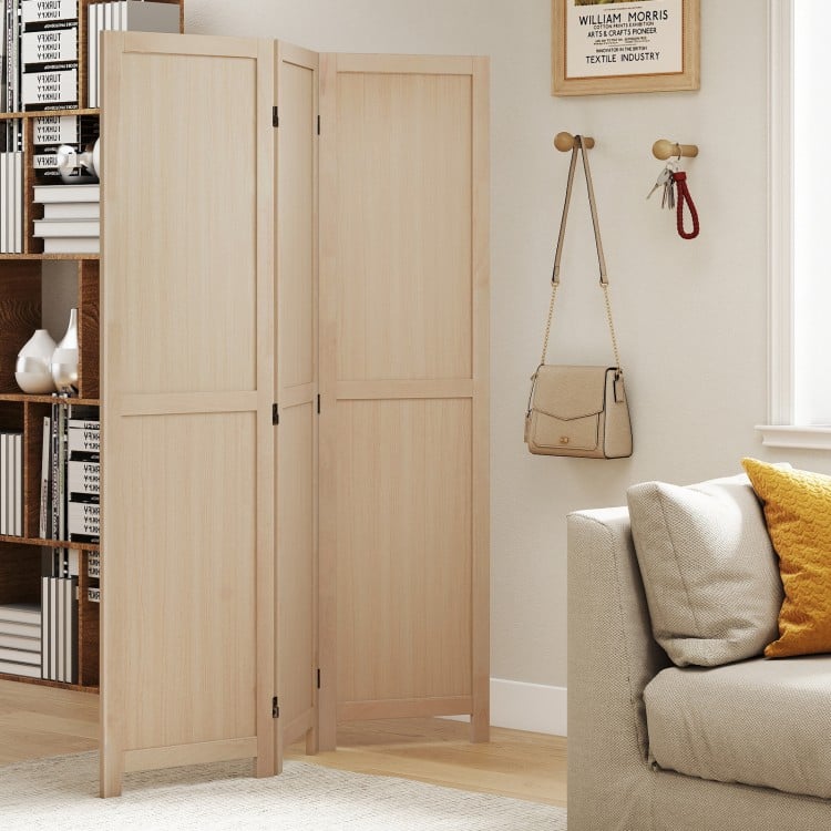 Three-panel folding room divider in beige, featuring a sturdy wood structure and smooth metal hinges for versatile use.