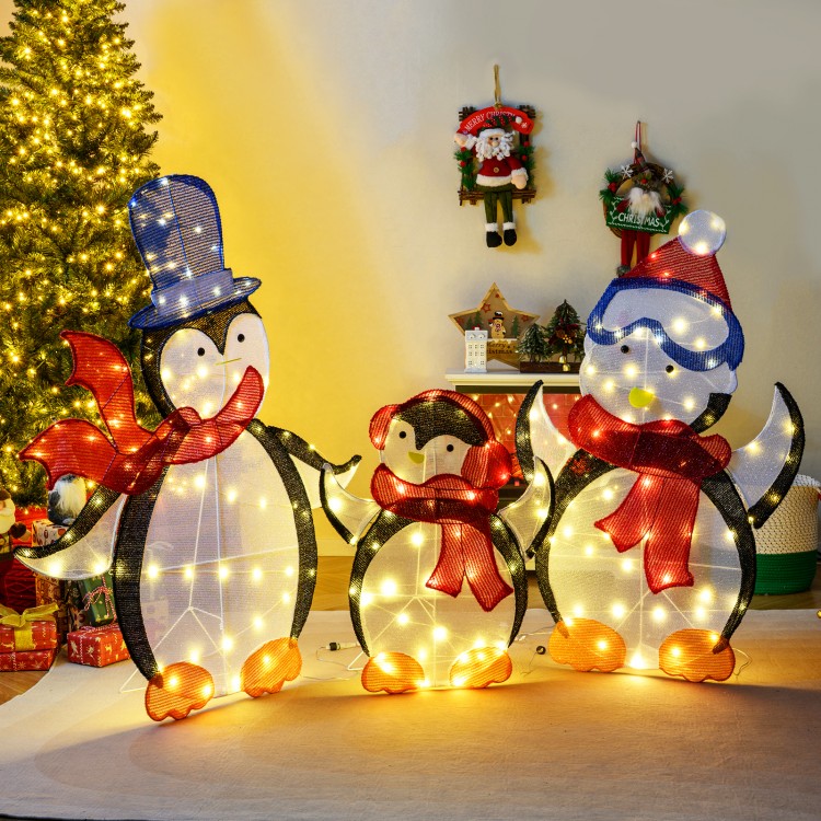 Lighted 3-piece penguin family Christmas decoration with 160 LED lights, featuring a dad, mom, and baby penguin in.