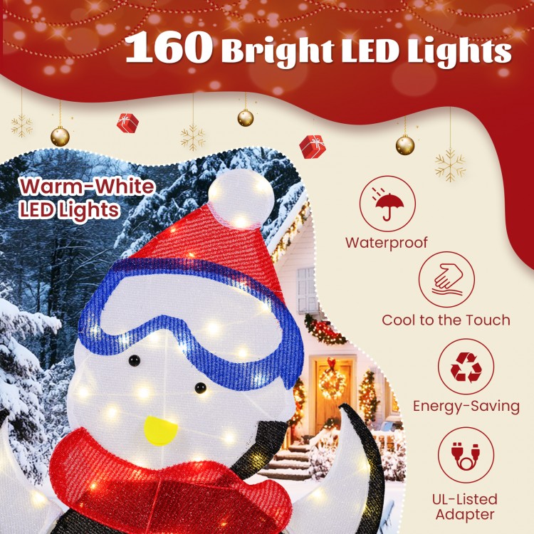 3-piece lighted penguin family Christmas decoration with 160 warm-white LED lights, ideal for indoor or outdoor use.