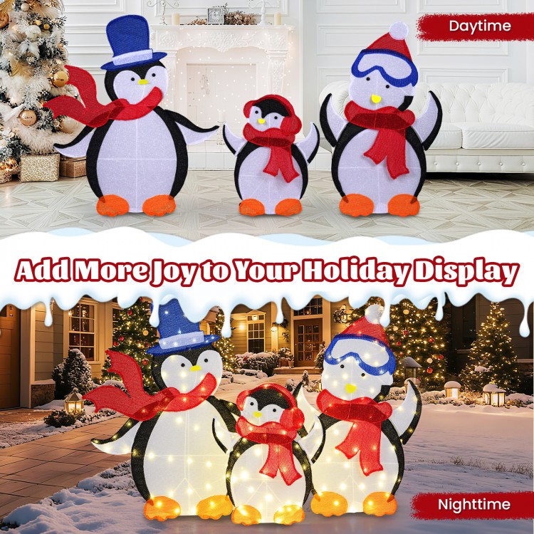 3-piece lighted penguin family Christmas decoration with 160 LED lights, wearing scarves, for indoor or outdoor use.