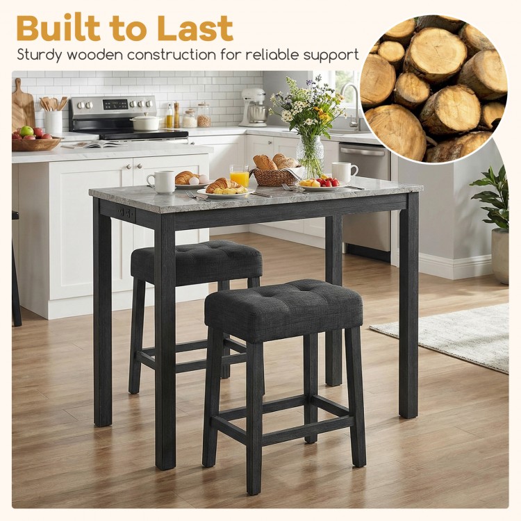 3-piece bar table set featuring a faux marble top, sturdy gray wooden construction, and upholstered stools for comfort.