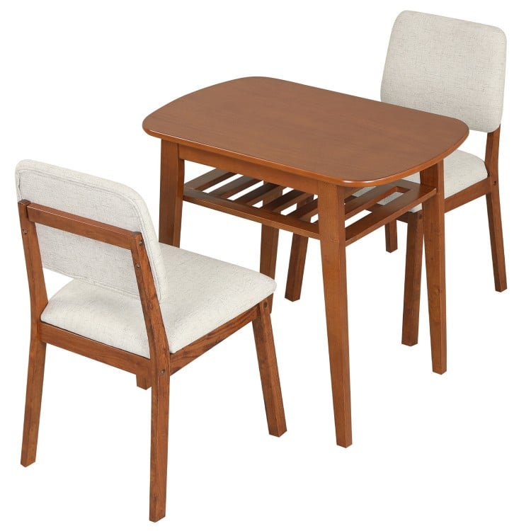 3-piece dining table set with cherry finish, featuring upholstered chairs and built-in storage rack for space-saving.