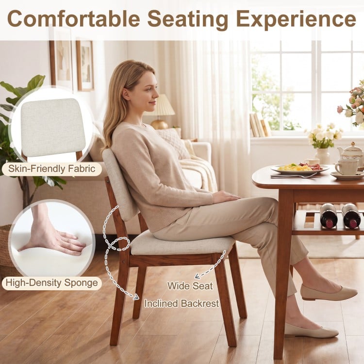Upholstered chair with wide seat and inclined backrest, featuring skin-friendly fabric for comfort in a dining set.