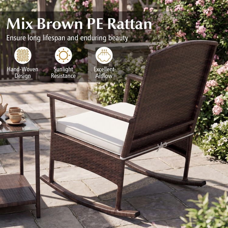 Mix brown PE rattan rocking chair with off-white cushion, designed for outdoor relaxation in backyard or porch settings.