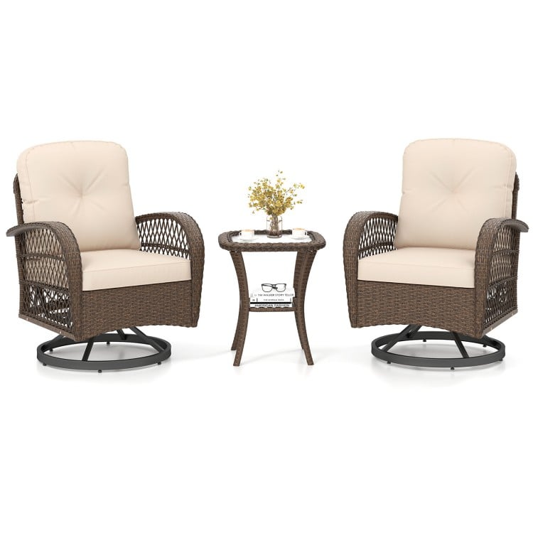 Patio swivel rocker set featuring brown rattan chairs with thick cushions and a tempered glass side table for outdoor.