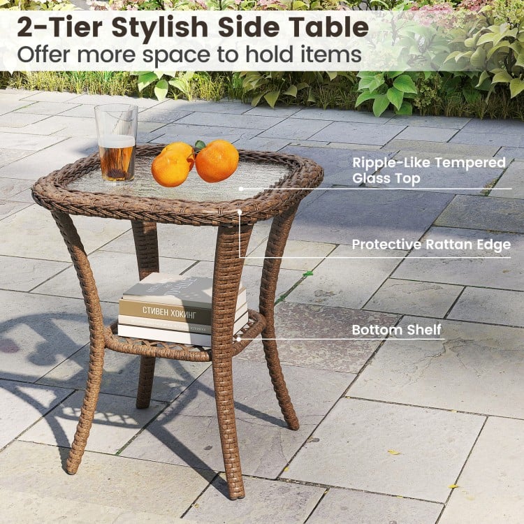 Stylish 2-tier side table with ripple-like tempered glass top and protective rattan edge, perfect for outdoor use.