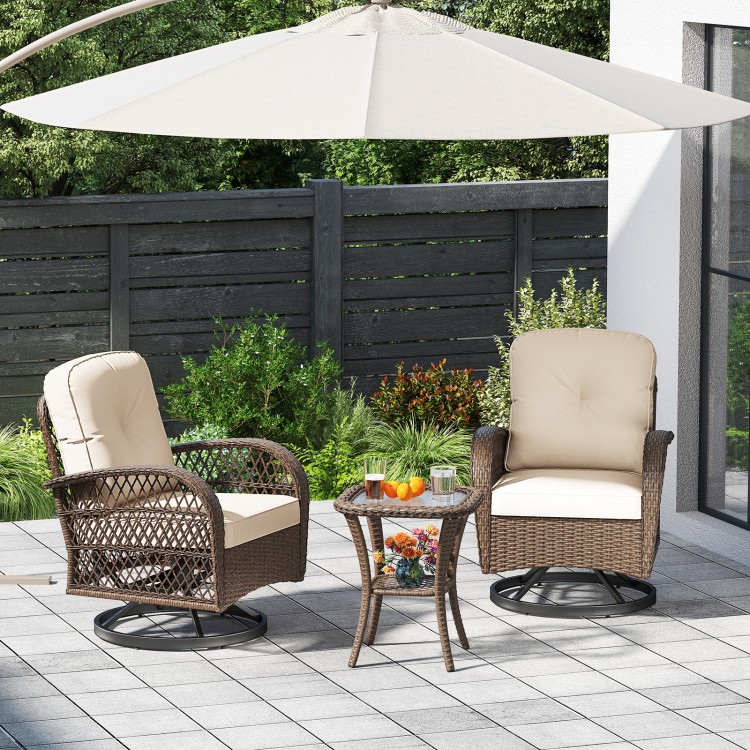 Patio swivel rocker set featuring well-woven rattan chairs with thick cushions and a tempered glass side table for.