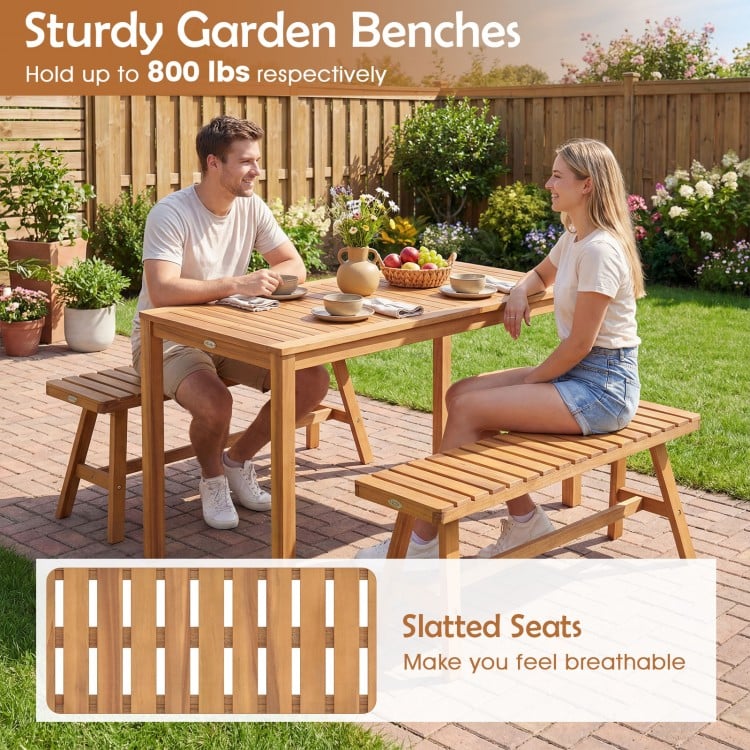 Acacia wood patio dining set with slatted seats, featuring a rectangular table and two benches for outdoor use.