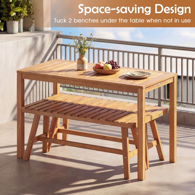 Acacia wood patio dining set featuring a rectangular table and two slatted benches, perfect for outdoor spaces.