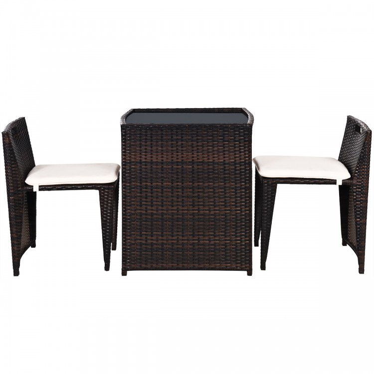Cushioned wicker patio bistro set with space-saving chairs, ideal for garden or poolside relaxation.