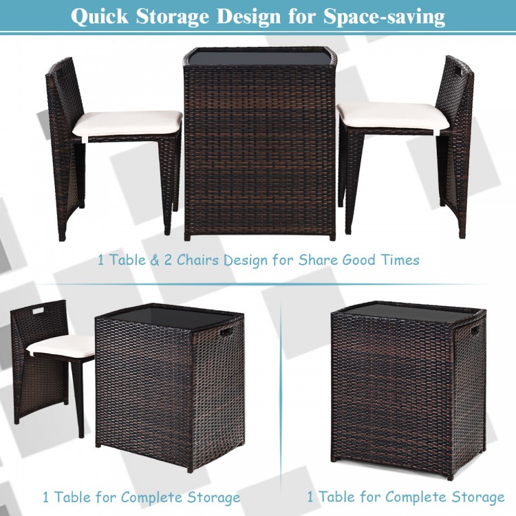 Cushioned wicker patio bistro set with space-saving design, featuring a table and two chairs for outdoor relaxation.
