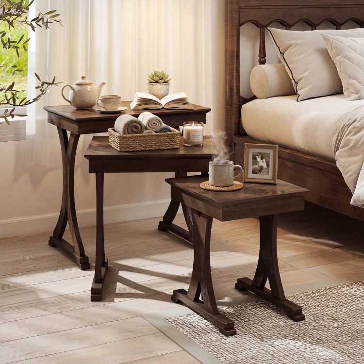 Close-up of a single nesting coffee table in brown with solid rubber wood legs, showcasing its elegant wood-like finish.