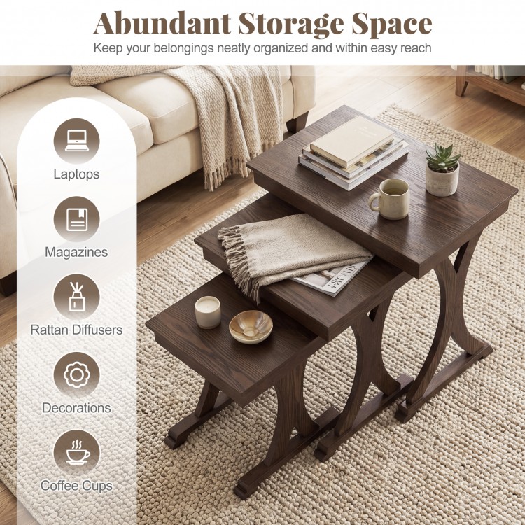 Nesting coffee table set of 3 with solid rubber wood legs in brown, ideal for organizing laptops and magazines.