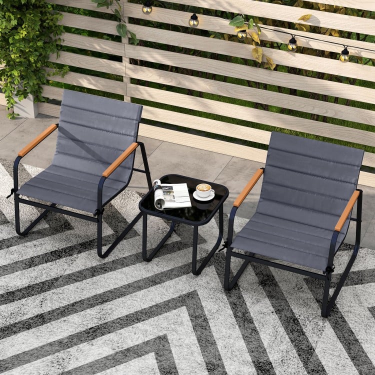 Gray patio bistro set featuring two chairs with removable cushions and a square side table, ideal for outdoor.