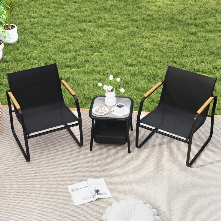 Top view of a black patio furniture set with two ergonomic chairs and a rustic square side table, ideal for outdoor.