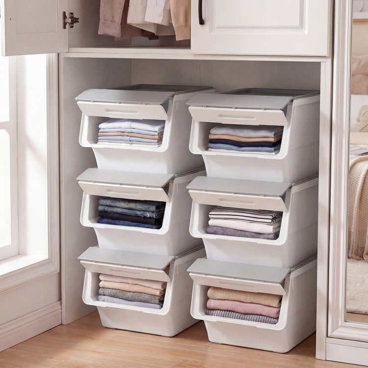 Stackable gray storage bins with stay-open lids, featuring 35 QT capacity and wheels for easy mobility, perfect for.