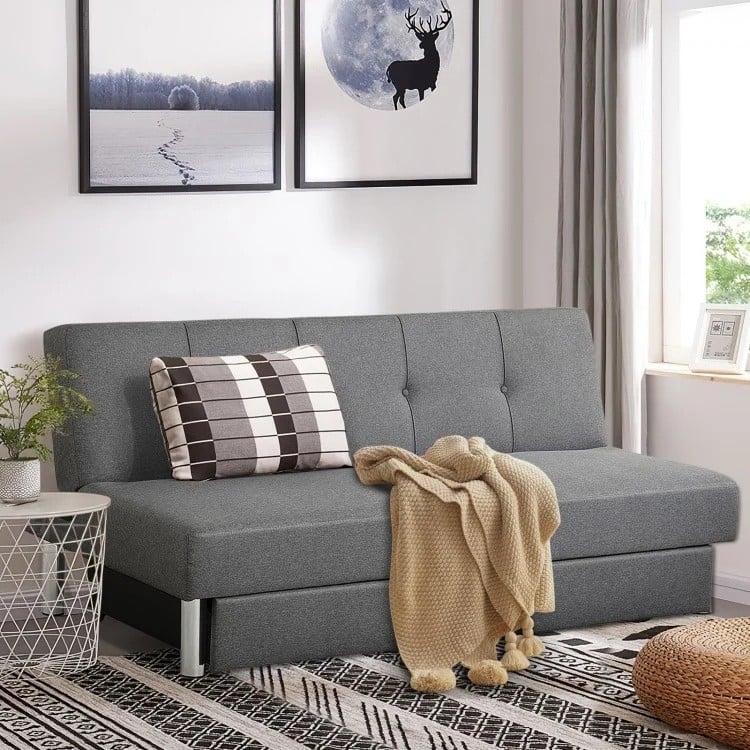 Gray 3-seat convertible sofa bed with adjustable backrest, large drawers, and ergonomic design for small spaces.