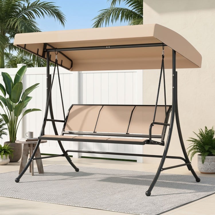 Beige 3-seat patio swing chair with adjustable canopy, featuring a spacious design and breathable fabric for outdoor.