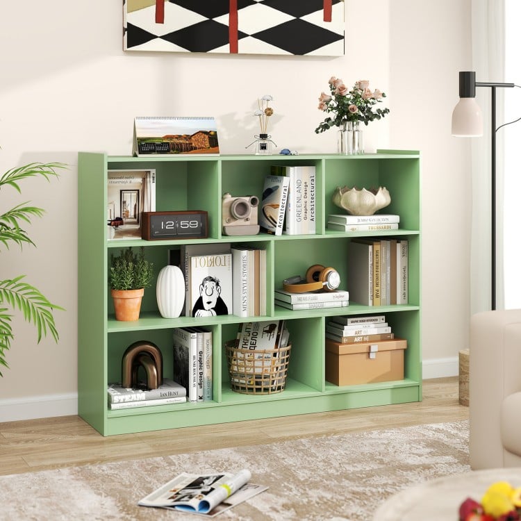 Green 3-tier open bookcase showcasing 8 cubes, ideal for displaying decor or storing items in a stylish living space.