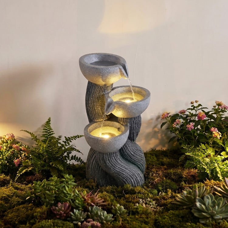 Three-tier outdoor water fountain with LED lights, resin construction, and cascading design for patio or deck.