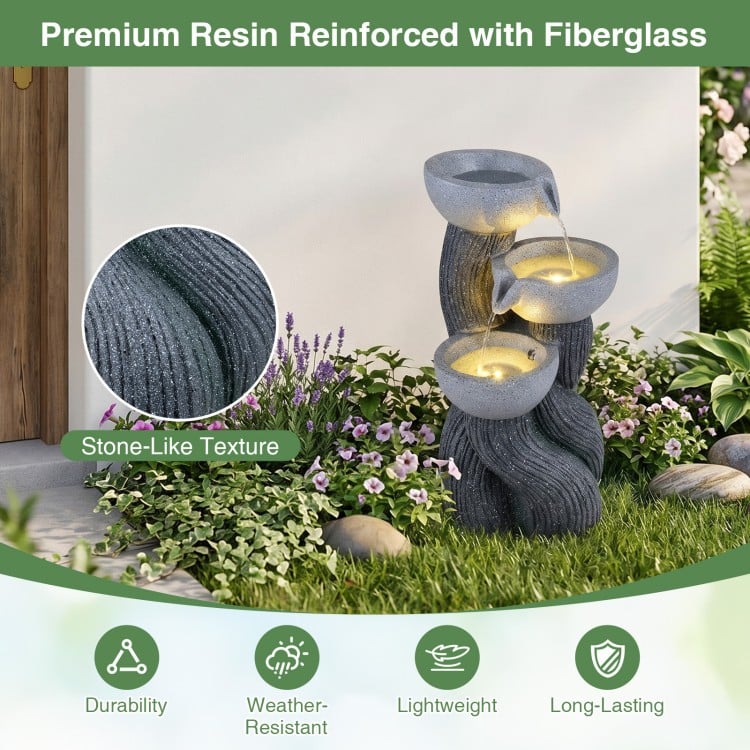 3-tier outdoor water fountain with LED lights, made of resin with branch-like texture, perfect for patio or deck.