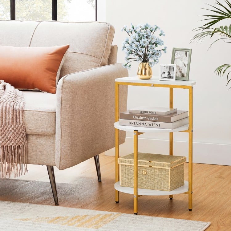 3-tier round end table with gold metal frame and white shelves, ideal for small spaces and bedroom organization.