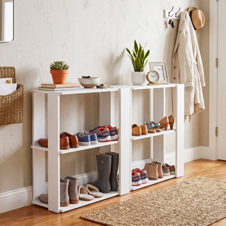 Three-tier shoe rack in white showcasing a stackable design, perfect for organizing footwear and enhancing entryway decor.