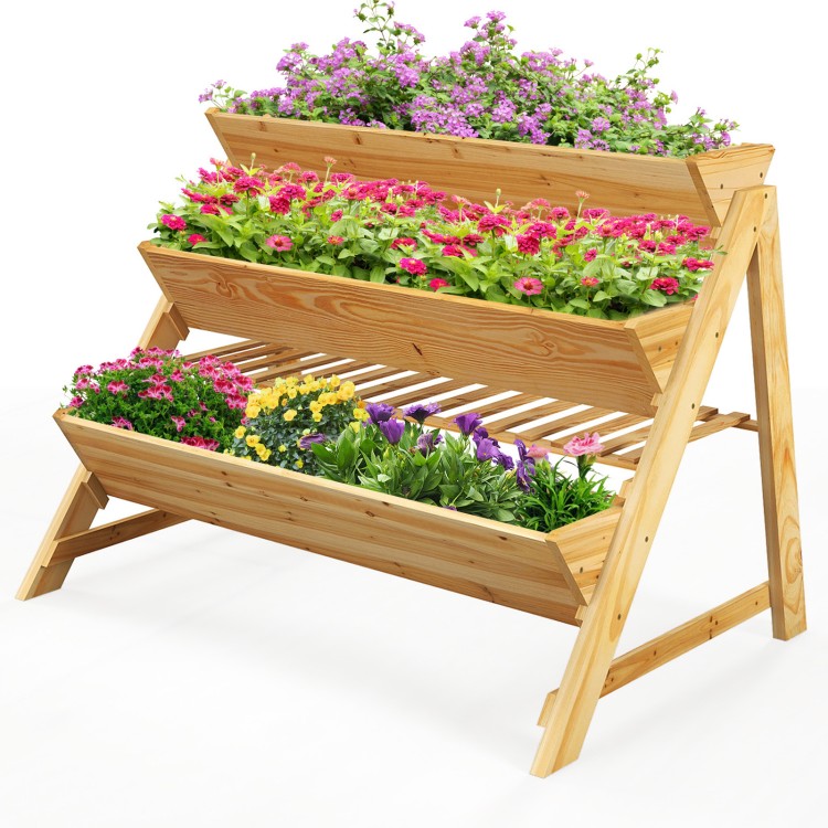 Three-tier wooden vertical raised garden bed with vibrant flowers, designed for efficient space-saving and drainage.