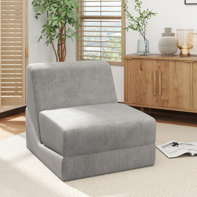 Gray 3-in-1 folding sofa bed with a corduroy cover, ideal for relaxing or watching TV, featuring a cozy inclined.