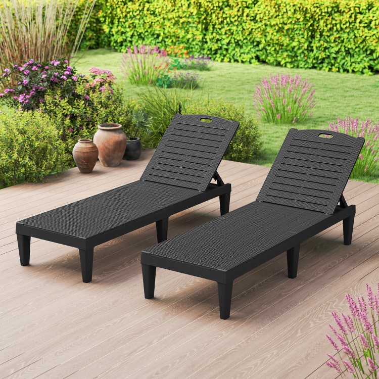 Black outdoor PP chaise lounge chairs set of 2 with adjustable backrests, perfect for poolside or backyard relaxation.