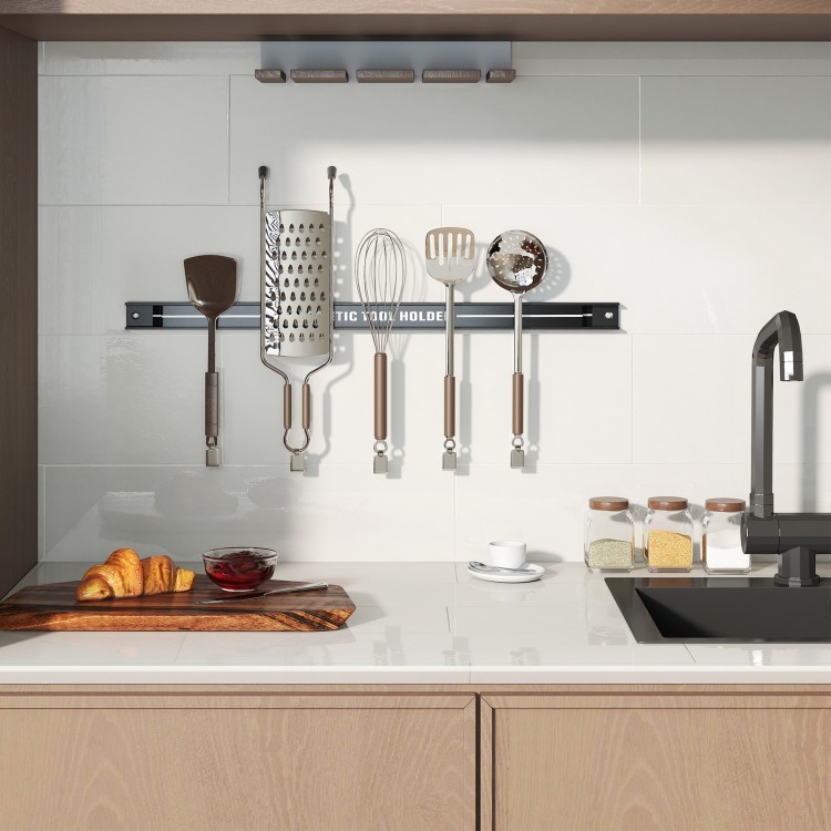 18-inch black magnetic tool holder strip with kitchen utensils, showcasing strong magnetic hold and sleek design for.
