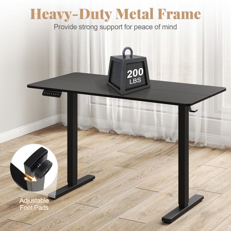 Ergonomic electric standing desk with a black metal frame, height adjustable from 28.5" to 46.5", supports 200 lbs.