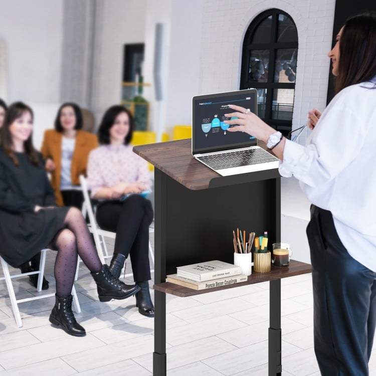 Height adjustable black podium stand with tilted tabletop and storage shelf, ideal for presentations and lectures.