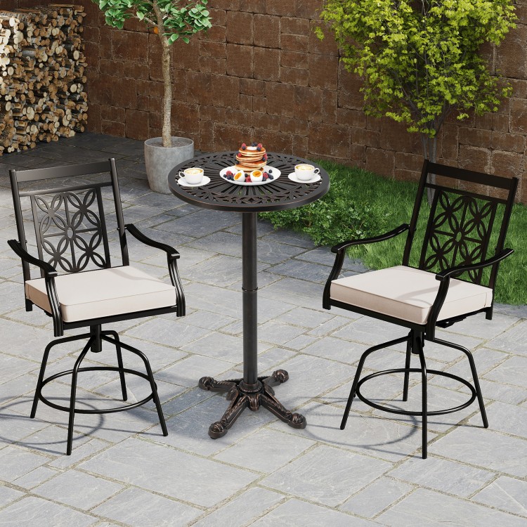 Round cast aluminum patio bar table with intricate patterns, suitable for outdoor settings like gardens and backyards.