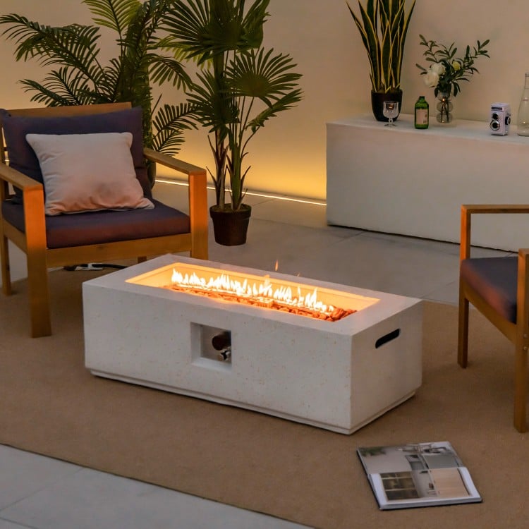 Rectangle terrazzo fire pit table with flames, 50,000 BTU output, for outdoor warmth and ambiance.