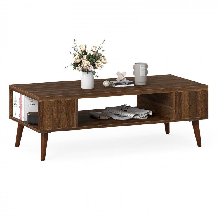 Mid-century modern walnut coffee table with open compartment and side shelves for organized storage and easy access.