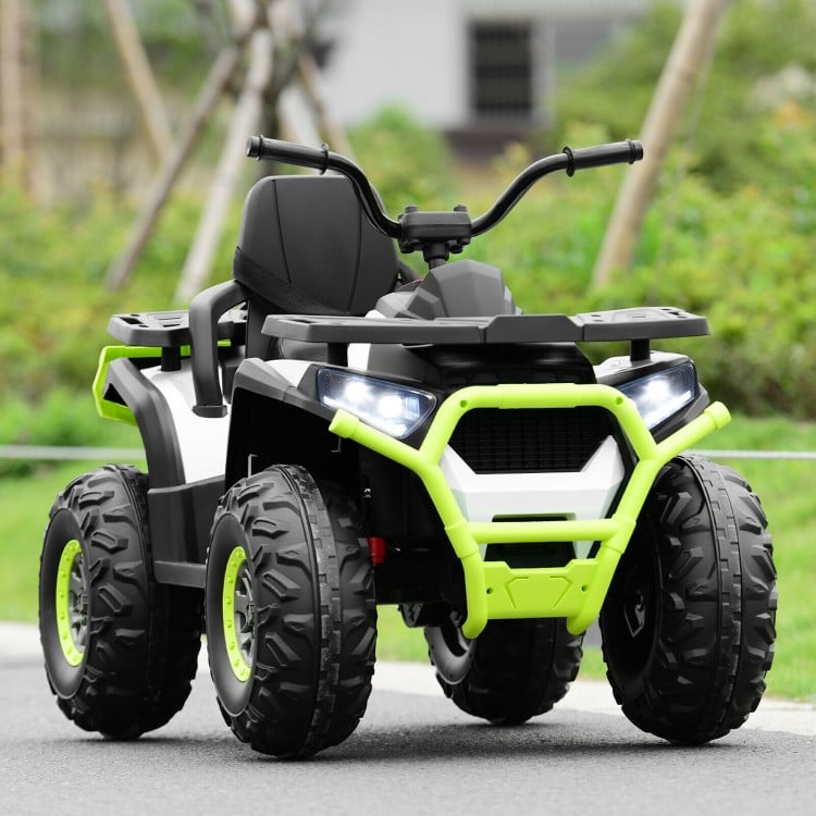 Side view of the 12V kids electric ATV quad in white, showcasing sturdy wheels, bright LED lights, and a comfortable.