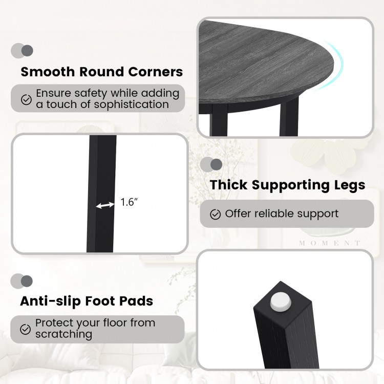 Round dining table with black rubber wood legs, smooth surface, and anti-slip foot pads, perfect for small spaces.