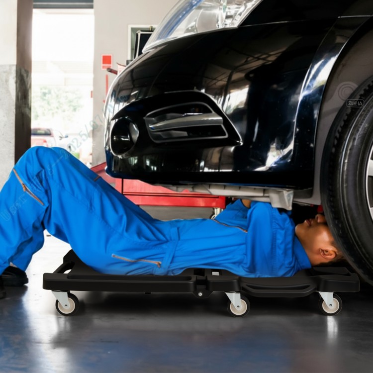 Mechanic creeper with padded headrest and tool trays, foldable design for easy storage, supports up to 350 lbs.